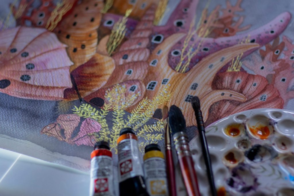 a close up of a painting on a table
